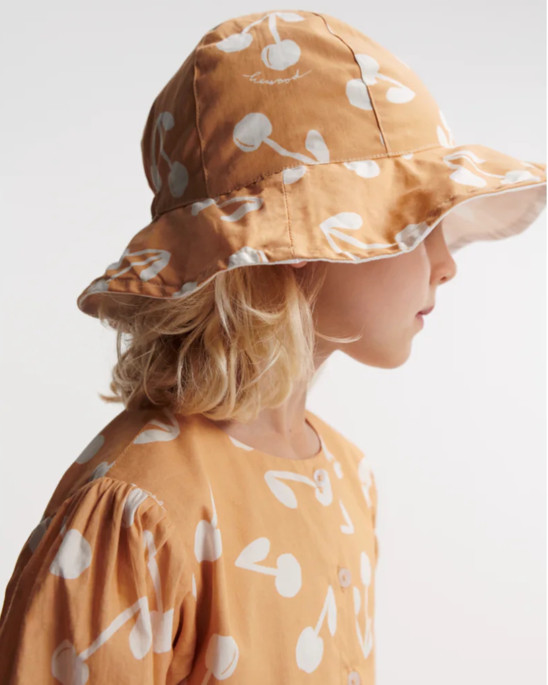 Liewood - dwustronny kapelusz przeciwsłoneczny Amelia Reversible cherry blossom light apricot