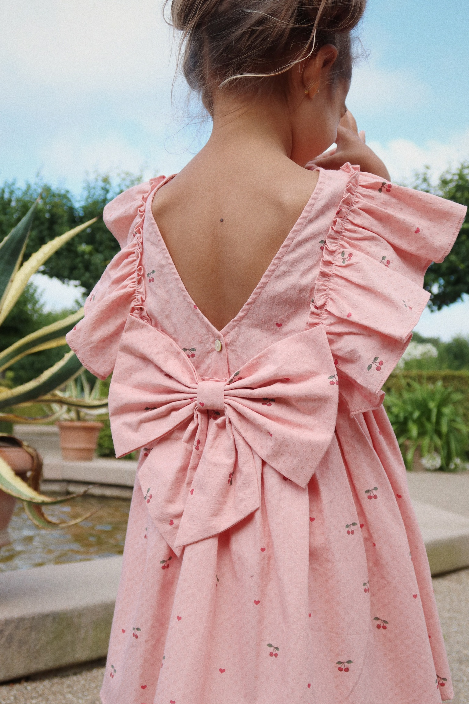 Konges Sløjd - sukienka dziecięca Evia Bow Dress GOTS Cherry Coeur
