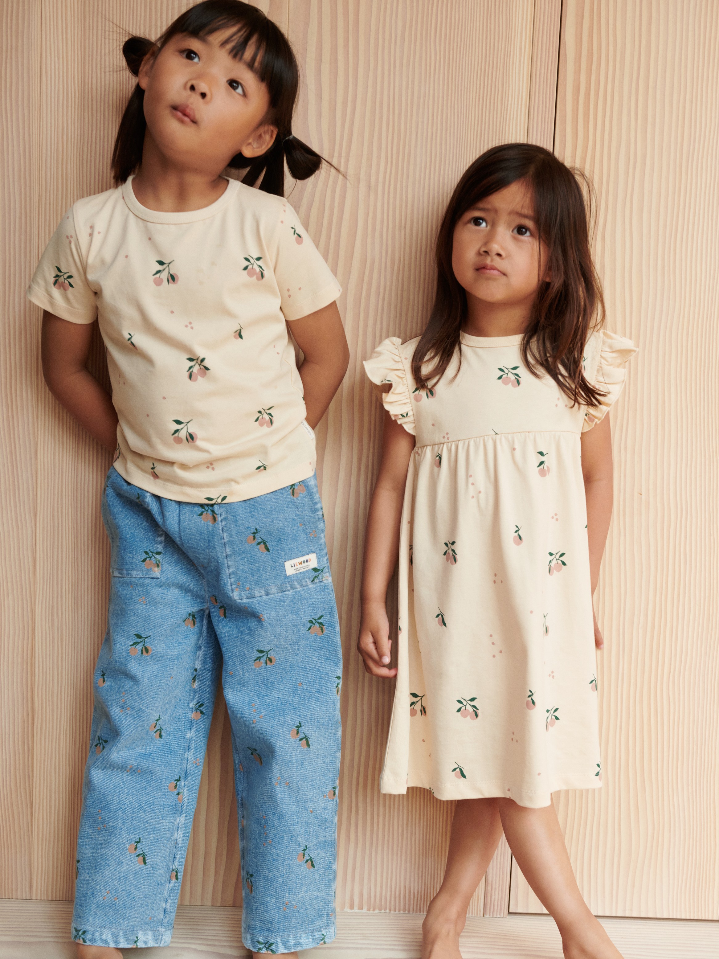 Liewood - spodnie jeansowe z nadrukiem Cesar light blue denim peach