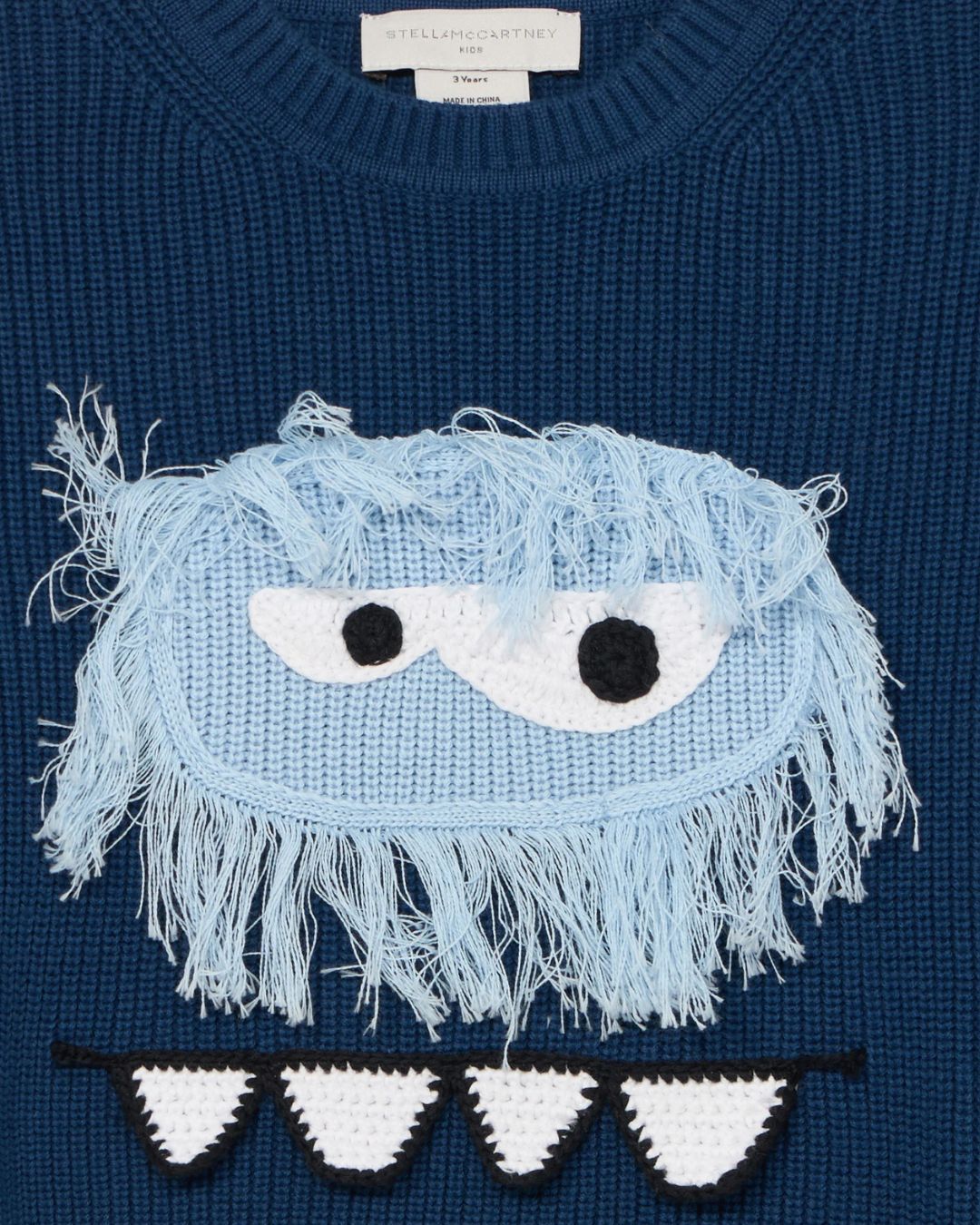 Stella McCartney - granatowy sweter z Yeti