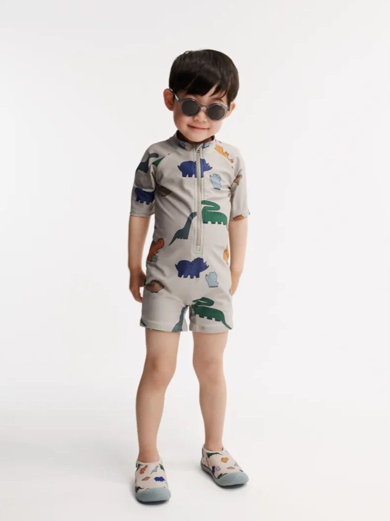 Liewood - kombinezon kąpielowy z krótkim rękawem UV Max Printed dinosaurs mist