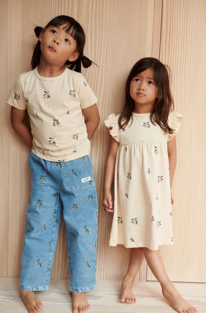 Liewood - spodnie jeansowe z nadrukiem Cesar light blue denim peach