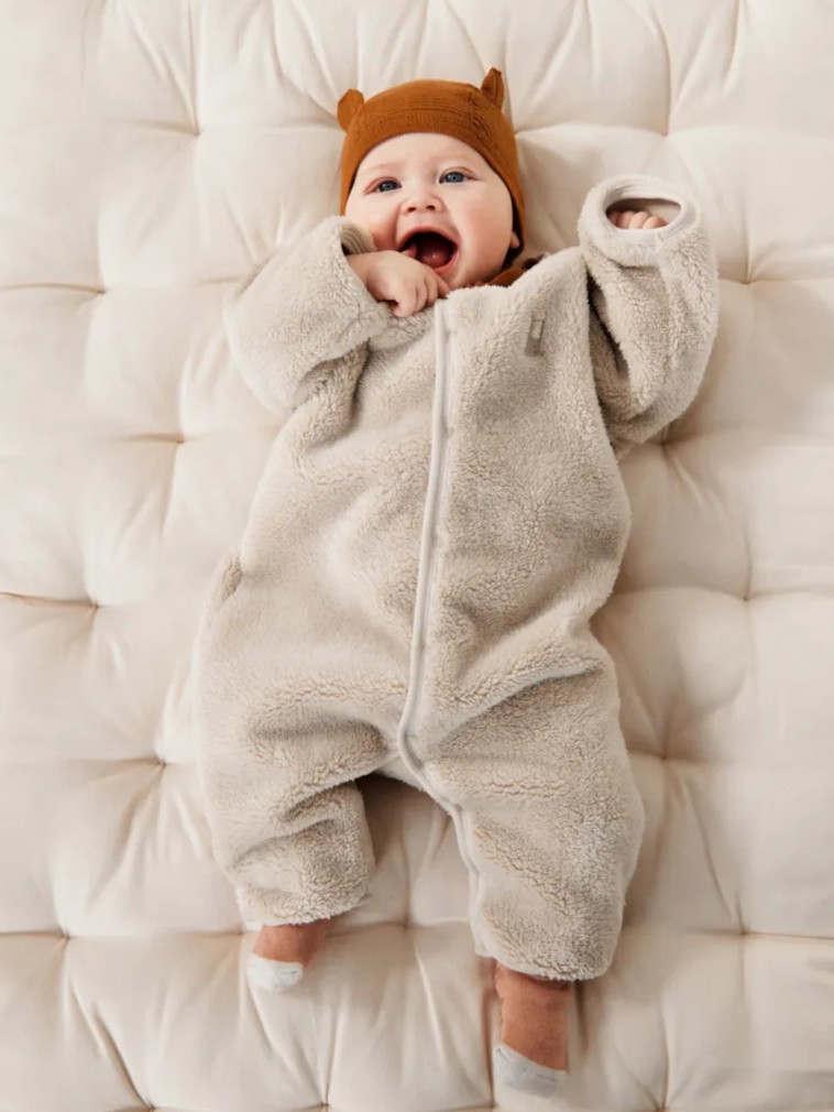 Liewood - pajacyk śpioszki niemowlęce Bailey Baby Pile Sandy