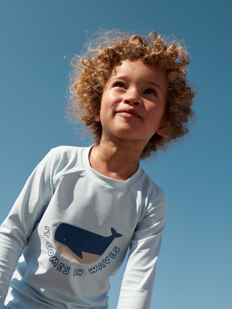 Liewood - koszulka kąpielowa z długim rękawem UV Noah Placement It comes in waves pure sky