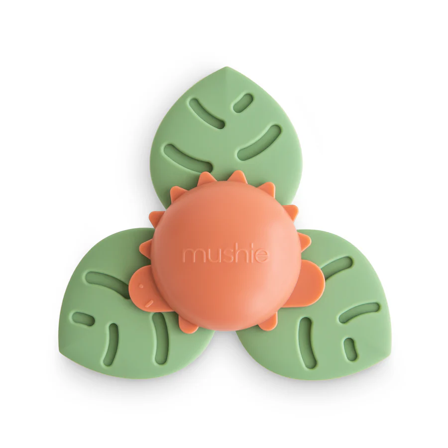 Mushie - spinner sensoryczny z przyssawką Dino