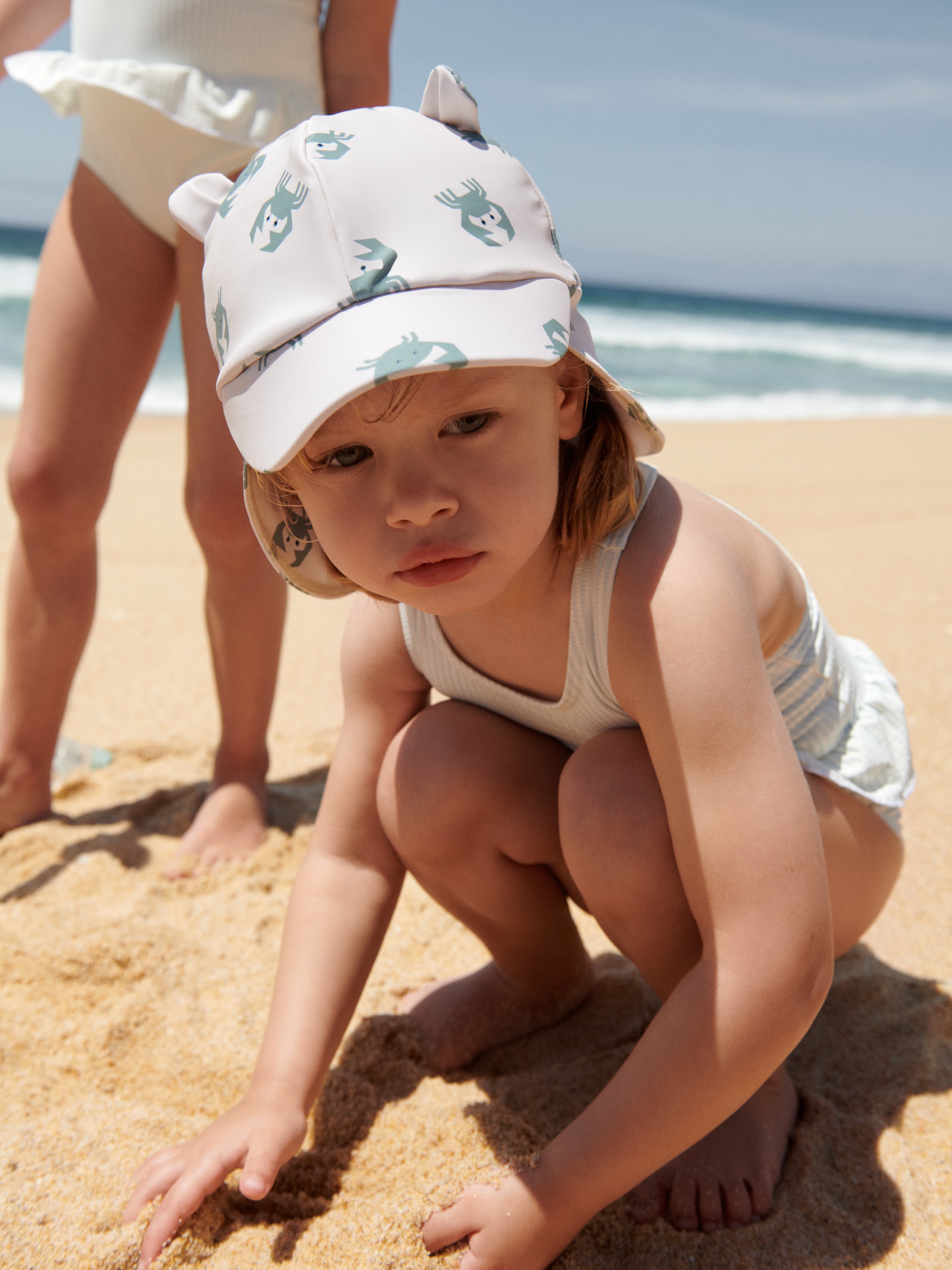 Liewood - kapelusz przeciwsłoneczny Senia z uszami crab sandy Liewood - kapelusz przeciwsłoneczny Senia z uszami crab sandy